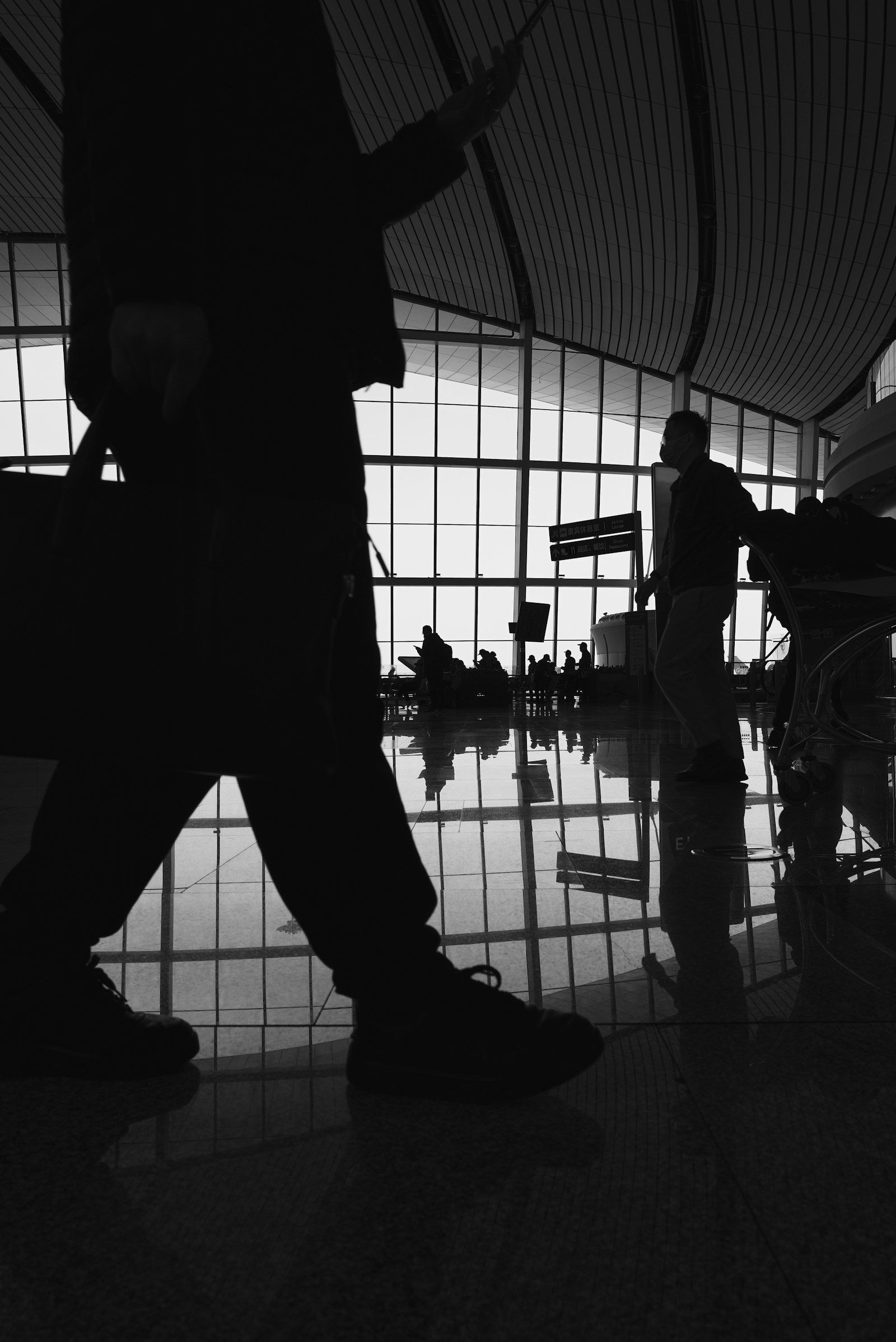 Traveler walking through a China airport terminal